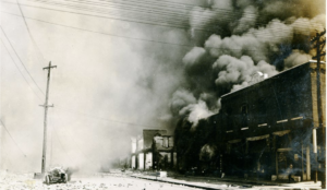 Greenwood businesses on fire in Tulsa, June 1, 1921