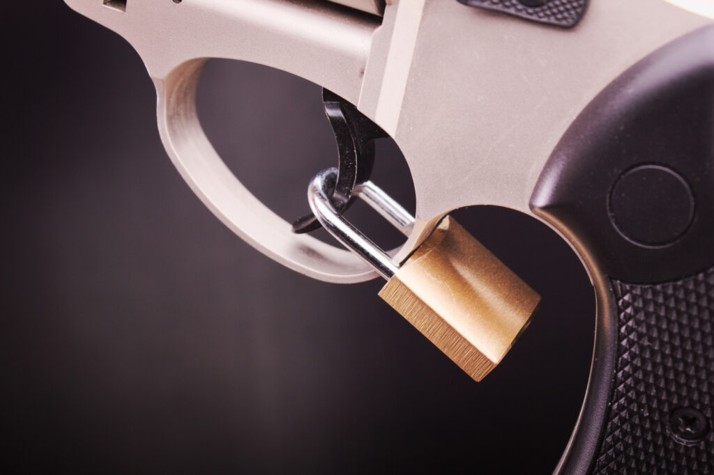 Pistol with a trigger lock. Image credit: iStock