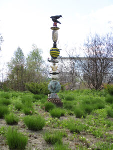 10 sculptures were created by Ann Arbor Potters Guild artists for an exhibition at the University of Michigan Matthaei Botanical Gardens titled "A Garden of Earthly Delights." Image credit: Jeri Hollister.