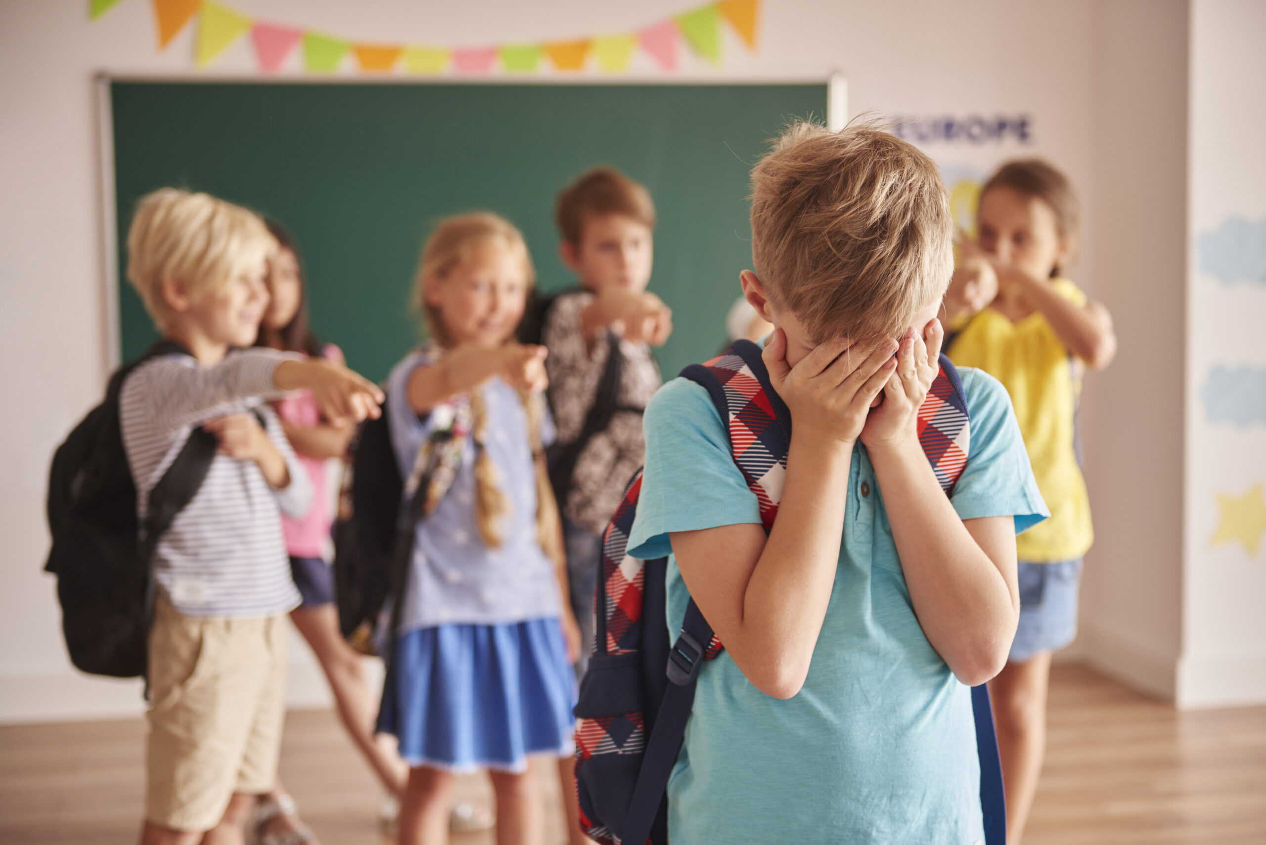 A child being bullied at school. Image credit: iStock