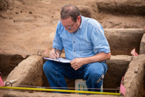 Independent researcher Thomas Talbot records his findings on the Belson Clovis Site in St. Joseph County. Image credit: Daryl Marshke/Michigan Photography