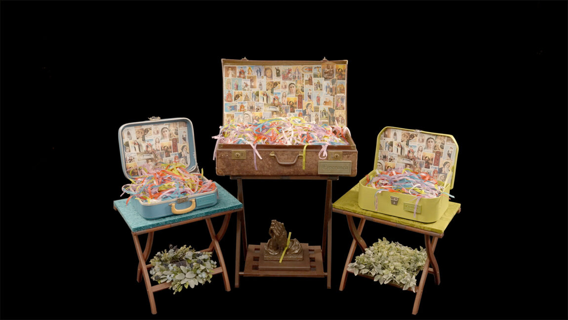 In his "Realm of the Dead" installation, Rogério Pinto uses the contents of various suitcases and trunks to convey key elements of his life.