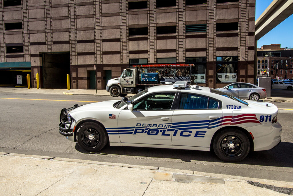 Detroit City Police Department car parked on the city street in downtown Detroit Michigan. Image credit: iStock