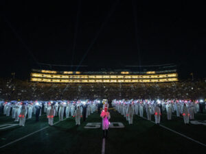 Marching Band paid tribute to those lost in 9/11 during a nighttime Sept. 11 halftime show at Michigan Stadium. Image credit: Eric Bronson/Michigan Photography.