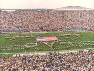 On Sept. 22, 2001, just 10 days after the 9/11 attacks, the Michigan Marching Band shared the field with the Western Michigan University Marching Band to pay tribute to those who lost their lives. Image credit: Dick Gaskill