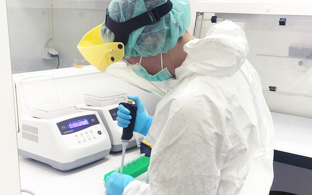 Lead author Shevan Wilkin, a paleoproteomics specialist at the University of Zurich, samples dental calculus in the clean lab of the Max Planck Institute for the Science of Human History. Image credit: Shevan Wilkin, University of Zurich, Max Planck Institute for the Science of Human History