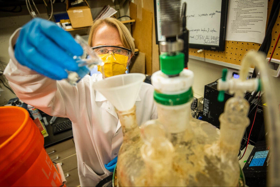 U-M researchers, including graduate research assistant Renata Rae Strarostka, are working on a new biodigester that converts organic solid waste from trash and wastewater into renewable methane. (Photo by Robert Coelius, College of Engineering)