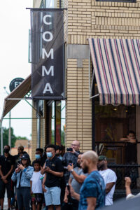 A crowd during a Comma Bookstore event. Image credit: Eric Bronson, Michigan Photography