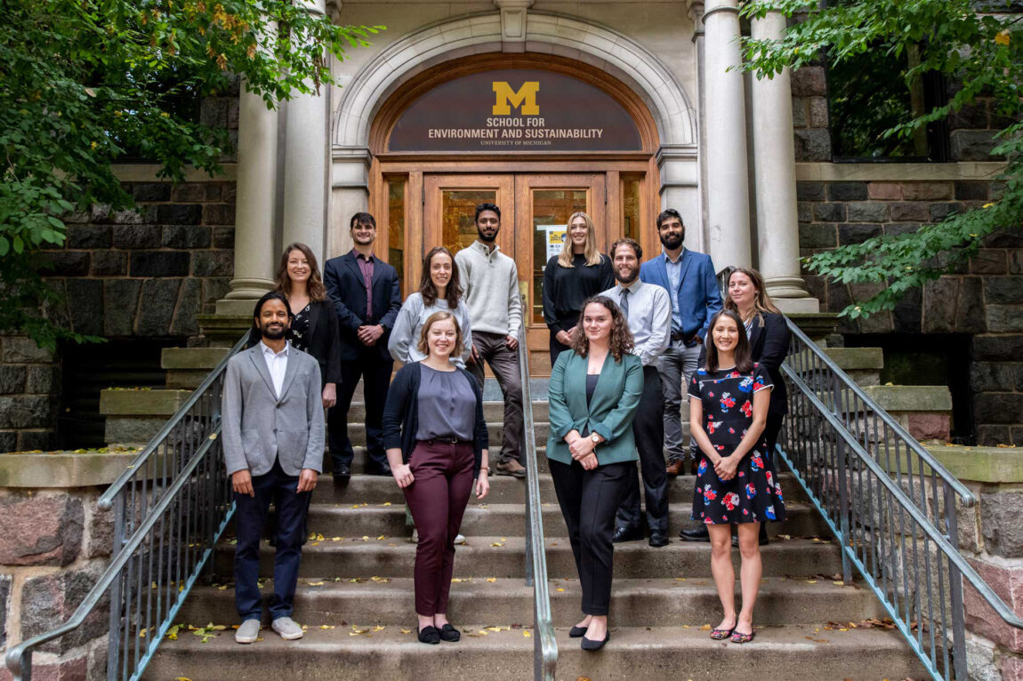 Thirteen University of Michigan graduate students and their faculty adviser are attending the two-week COP26 climate summit in Glasgow, Scotland. The students will observe the negotiations, attend side events and interact with various experts. U-M has sent student delegations to U.N. climate change conferences since 2009. The U-M attendees are, top row, from left: A.J. Convertino, Muhammad Abdullah, Chelsea Johnson, Evan Gonzalez. Middle row, from left: Jessica Miller, Annie Linden, Peter Siciliano, Sarah Collins. Bottom row, from left: Faculty adviser Avik Basu, Emily Johnson, Kristina Curtiss, Lauren Balotin. Not pictured: Naomi Barker, Natasha Dacic. (Photo by Dave Brenner, School for Environment and Sustainability)