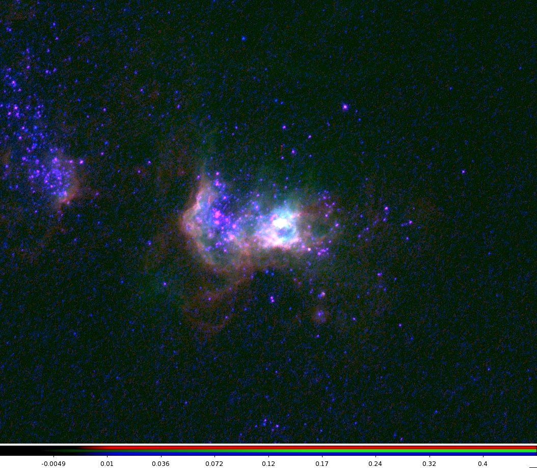 This image zooms in on the Mrk 71 region in the galaxy NGC 2366. The red, blue and green colors reflect the emission of oxygen and helium ions. The observations were made from the Hubble Space Telescope. Image credit: Sally Oey