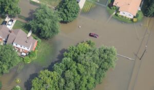 A Detroit residential street submerged under water