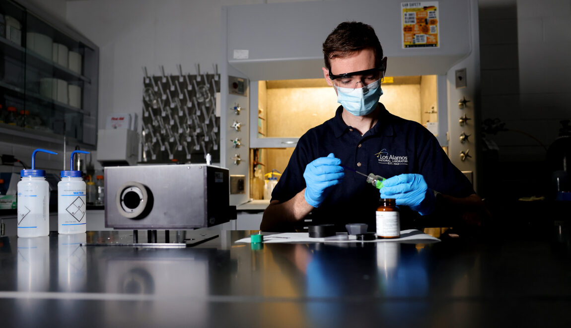 Mike Mayer, a mechanical engineering Ph.D. candidate, prepares samples as he begins working on characterizing the optical properties of ceramic powders. (Photo by Brenda Ahearn, Michigan Engineering)