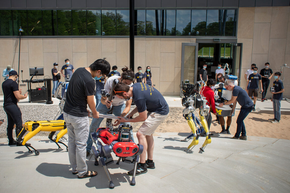 Robots are organized to showcase the Robot Garden near the Robotics Institute building in May. 