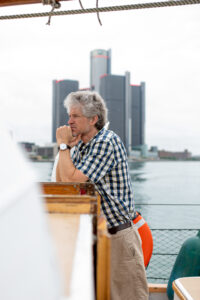 Professor of English and comparative literature David Porter on the schooner Inland Seas. Image credit: Eric Bronson, Michigan Photography
