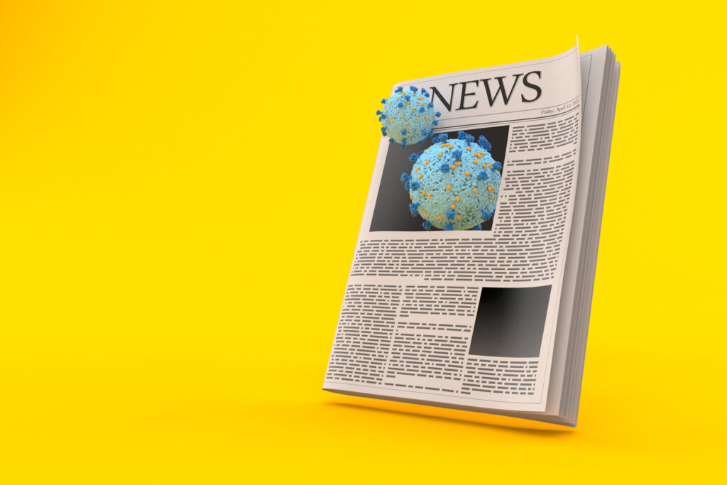 Virus inside newspaper. Image credit: iStock