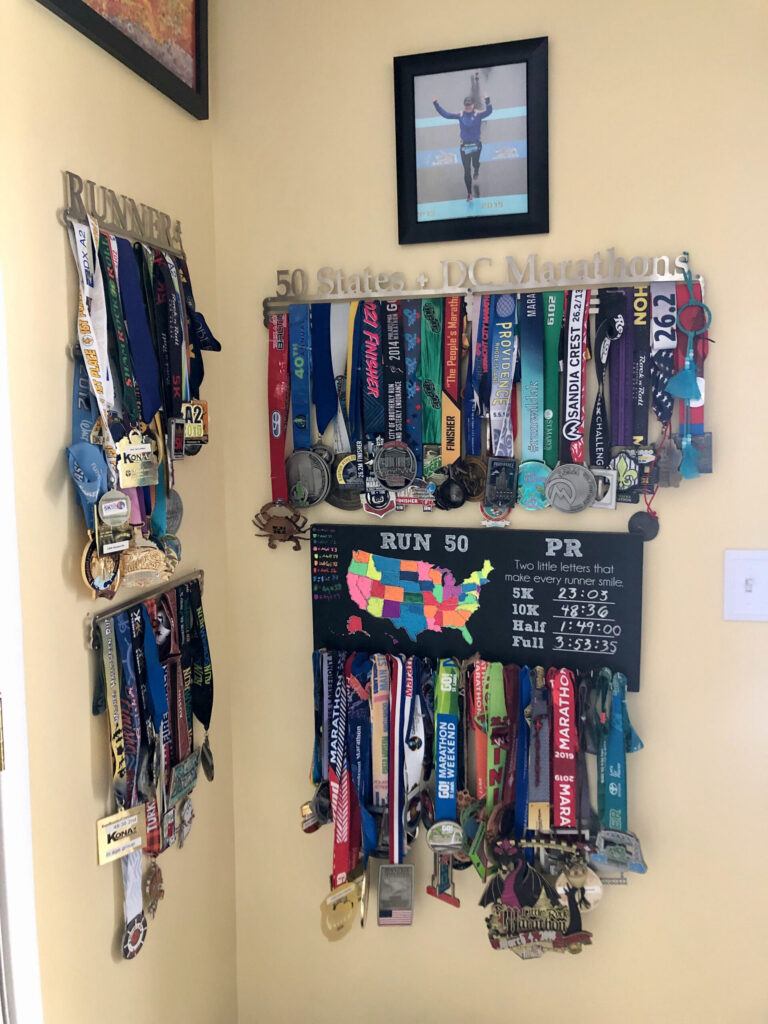 The medals earned by Nancy Ambrose King, who completed a marathon in all 50 states. (Photo courtesy of Nancy Ambrose King)