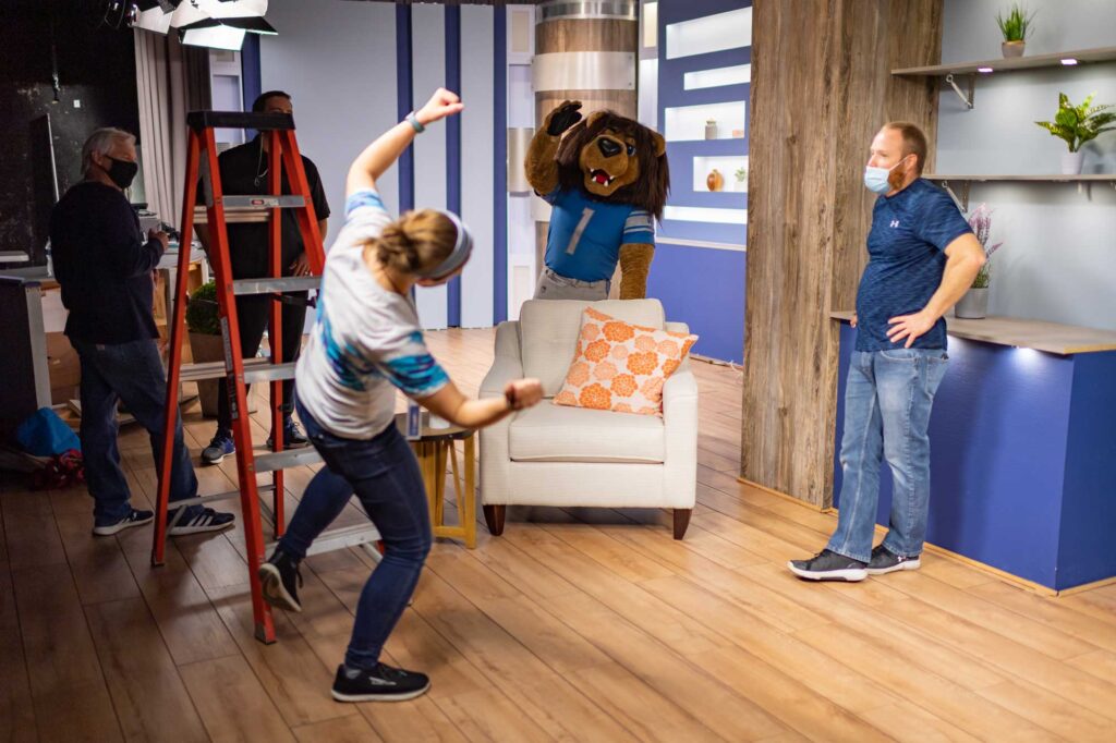 Roary, the Detroit Lions mascot, while filming some InPACT exercise sessions at the Detroit Public Television Studio. Image credit: Daryl Marshke, Michigan Photography