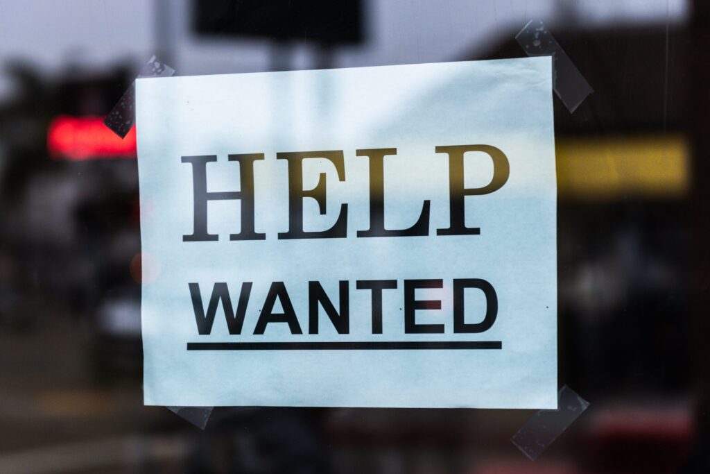 A help wanted sign. Image credit: Tim Mossholde, Unsplash