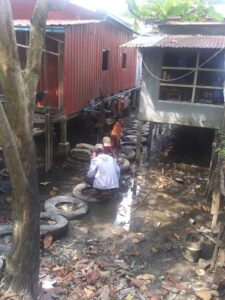 University of Michigan researcher Leon Espira and local partners collect samples in urban Yangon Homes in Yangon, Myanmar.Photo credit: Leon Espira, University of Michigan