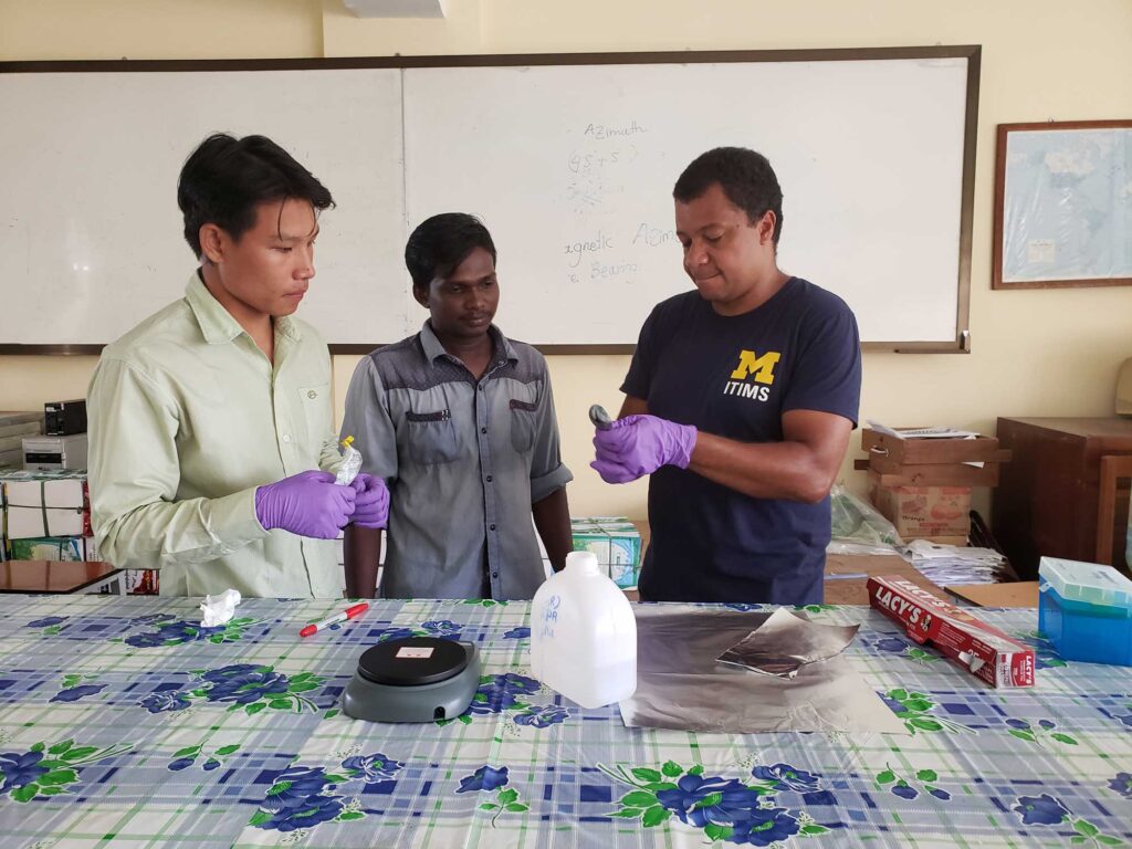 Leon Espira and students at West Yangon University process samples of water and soil taken in Yangon, Myanmar, in the fall of 2019. Photo Credit: Pamela Jagger, University of Michigan