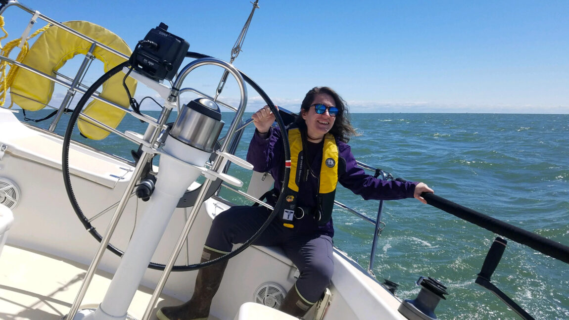Holly Kelchner, an aquatic ecology research analyst with the Cooperative Institute for Great Lakes Research, spends much of her time at work on the lakes. (Photo courtesy of Holly Kelchner)