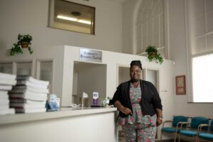 Jawana Jackson, a program manager at U-SNAP-BAC, a nonprofit housing organization, credits faculty and students from U-M for helping the community create tools and gain access to resources that helped stabilize it. Image credit: Eric Bronson