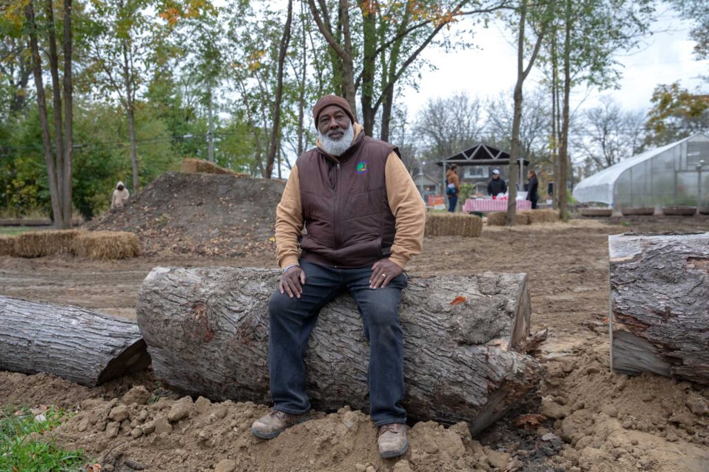 Aaron Smith, founder of Motor City Grounds Crew, moved his business to MorningSide two years ago. He's located at Warren Avenue and Balfour Road and has been struck by the community's "great pride." Image credit: Rebecca Cook