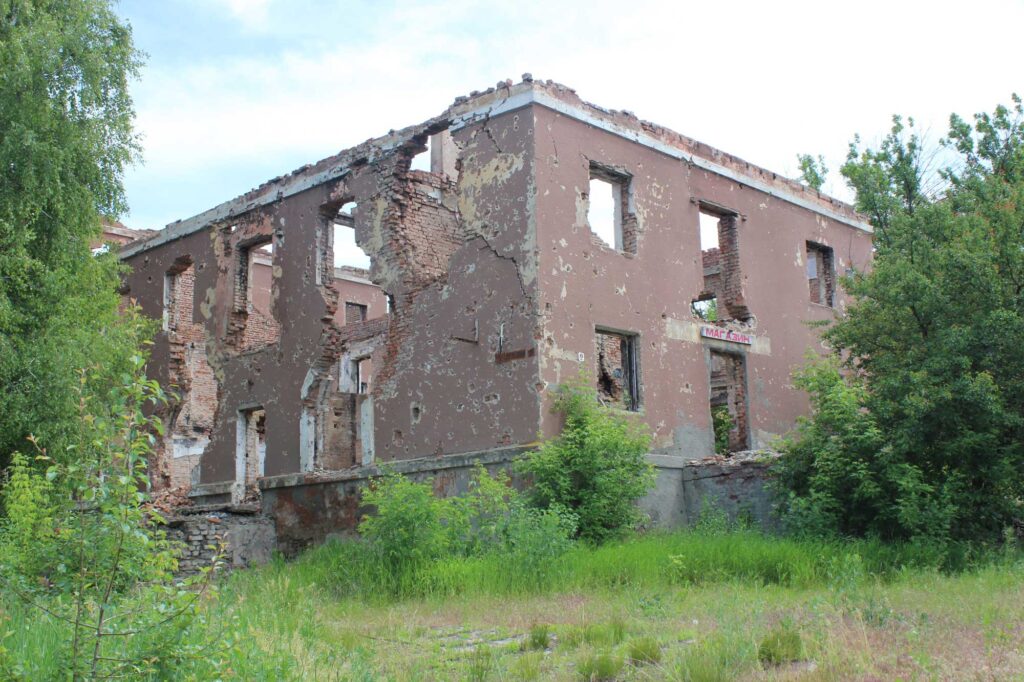 The remains of a store in Sloviansk, Donetsk republic. Sloviansk town is the place where the very first shots were fired in 2014. The picture was taken in June 2017, providing evidence the city was still recovering. Image credit: Greta Uehling