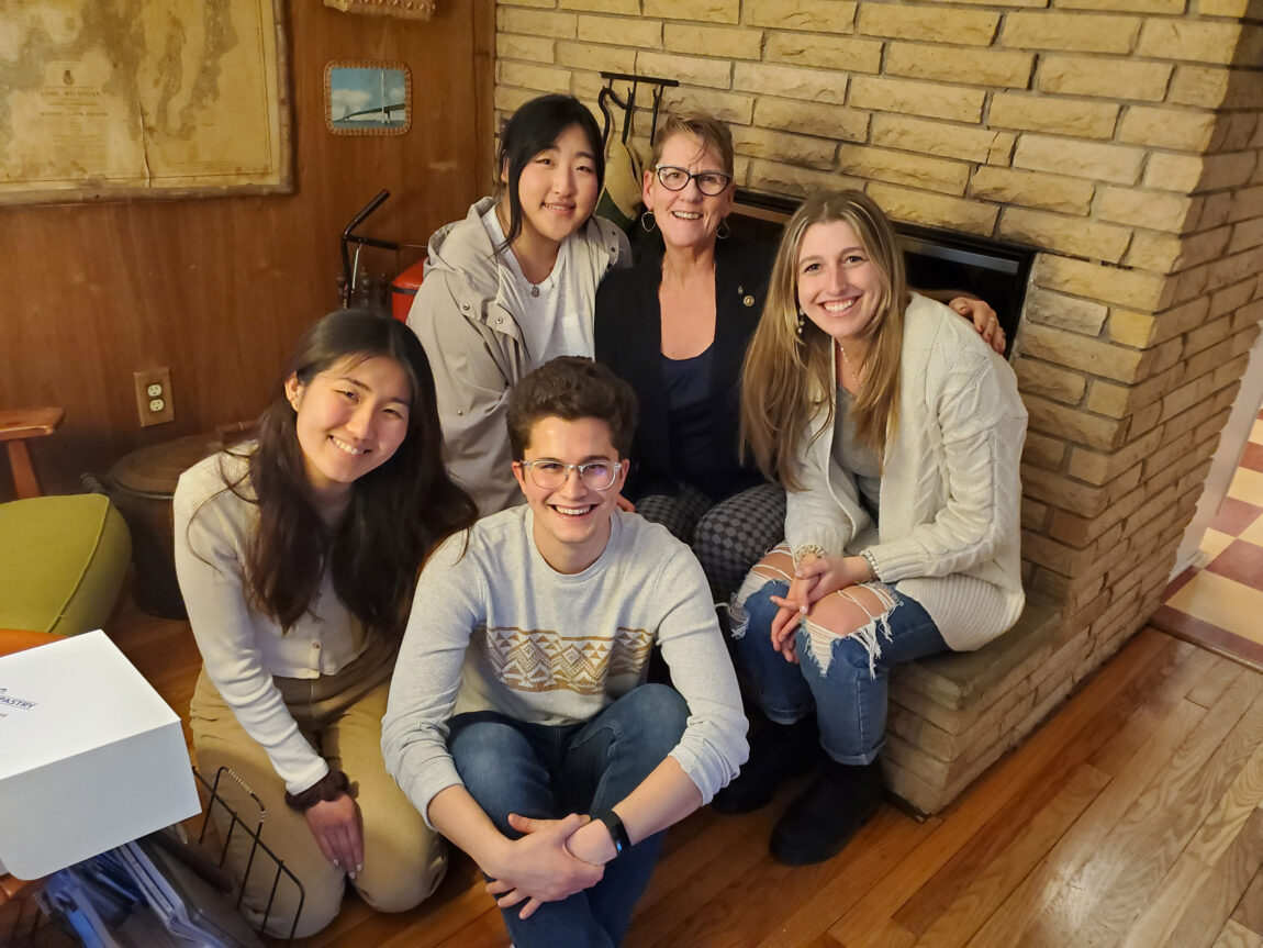 Joanne Pierson, second from right, project manager for DyslexiaHelp and past president of the Rotary Club of Ann Arbor, poses for a photo with U-M Rotaract Club presidents and vice presidents from this year and next year, from left, Sarah Ong, Eunice Choi, Trevor Versalle and Alexandria Galens. (Photo courtesy of Joanne Pierson)