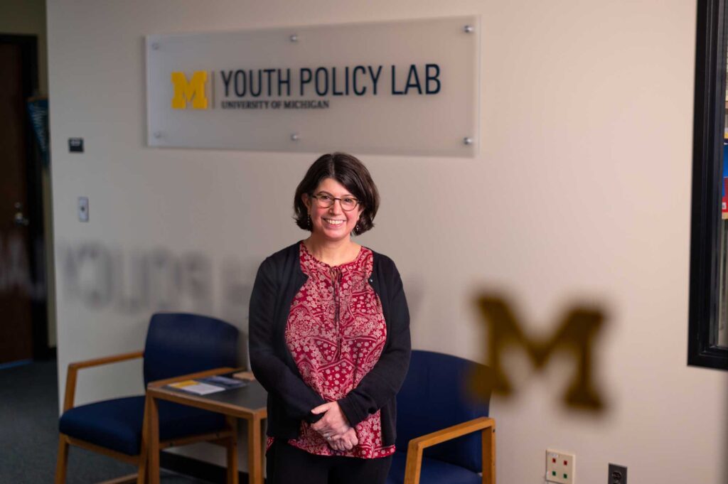 Robin Jacob, associate professor and founder of the Youth Policy Lab, and colleagues developed a math enrichment program called High 5s to help close the achievement gap. Image credit: Eric Bronson