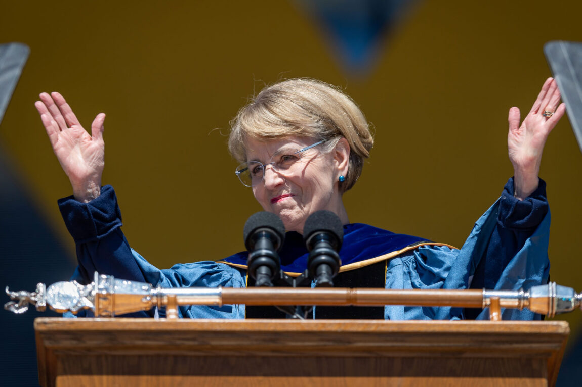 President Mary Sue Coleman acknowledges the graduates at the Comeback Commencement.