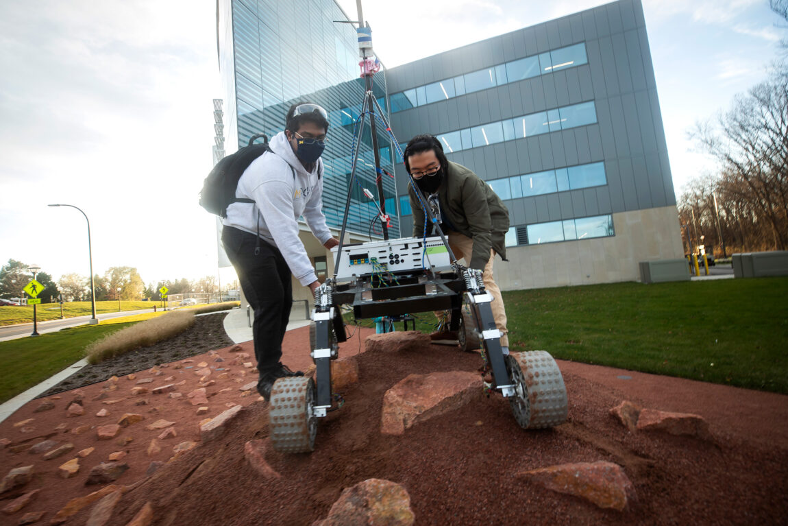 Members of the Michigan Mars Rover team test its rover on the Mars Yard outside of the Ford Motor Company Robotics Building. Robots meant for space and planet exploration are tested on this specially designed terrain. (Photo by Joseph Xu, College of Engineering)
