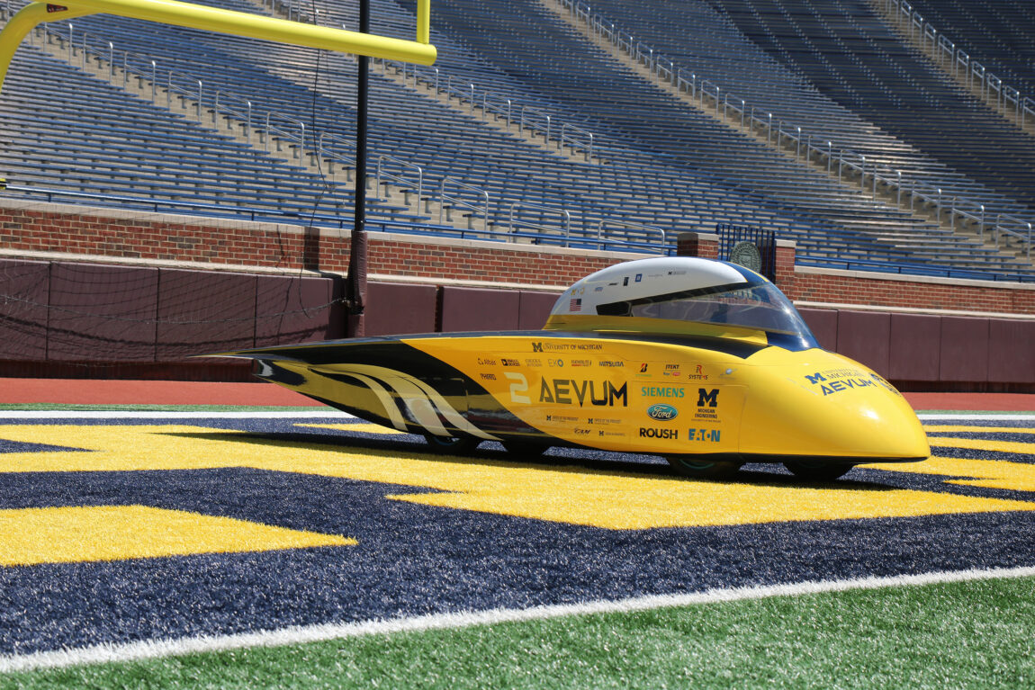 The Aevum solar car, shown in Michigan Stadium, was unveiled in the Michigan Union ballroom June 10. (Photo by Liana Lau, Solar Car Team)