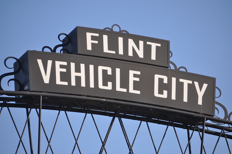 Flint Vehicle City Arches in Downtown Flint During Back to the Bricks 2013. Image credit: Michigan Municipal League via Flickr