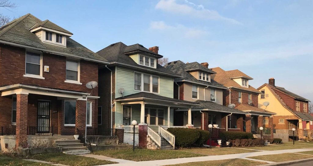 A row of houses in Detroit. Image courtesy: Poverty Solutions