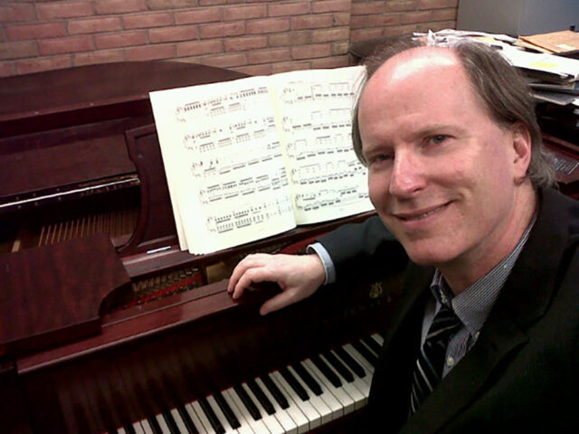 John Ellis, associate professor of piano and piano pedagogy in the School of Music, Theatre & Dance, helps administer two community engagement programs that teach piano to young people. (Photo courtesy of John Ellis)