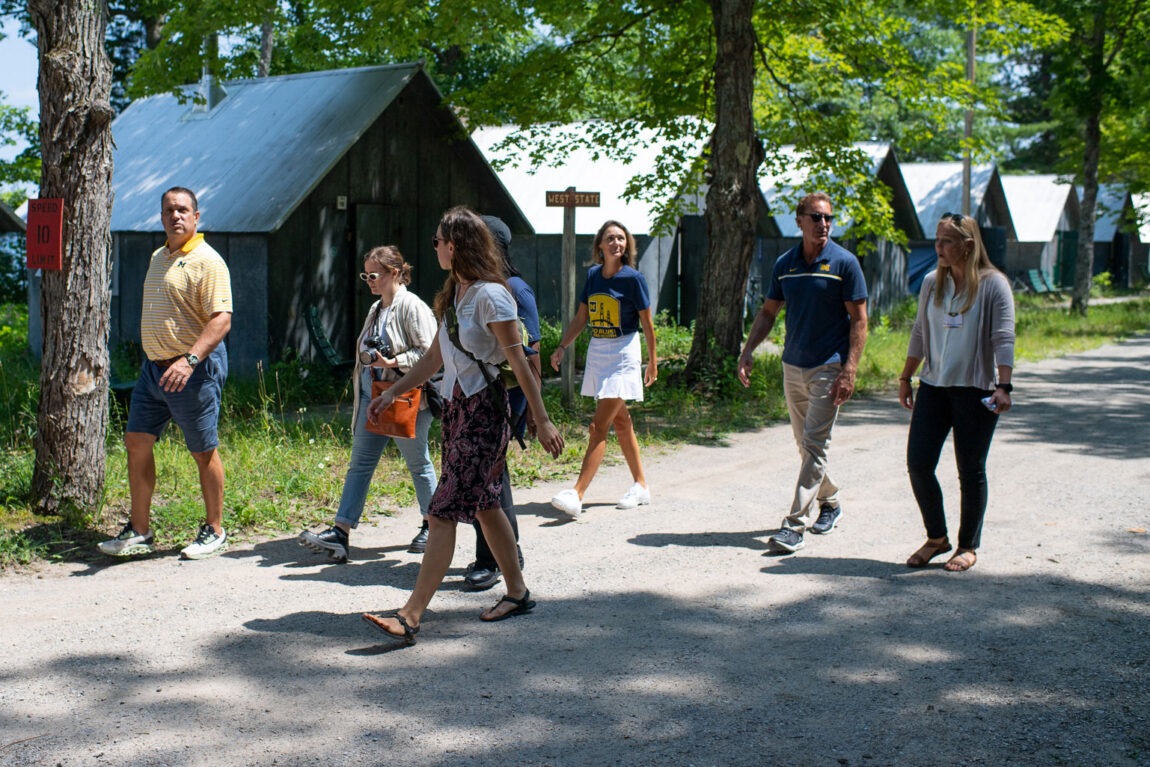 Photo of U-M regents, executives and staff members touring the Biological Station at Douglas Lake