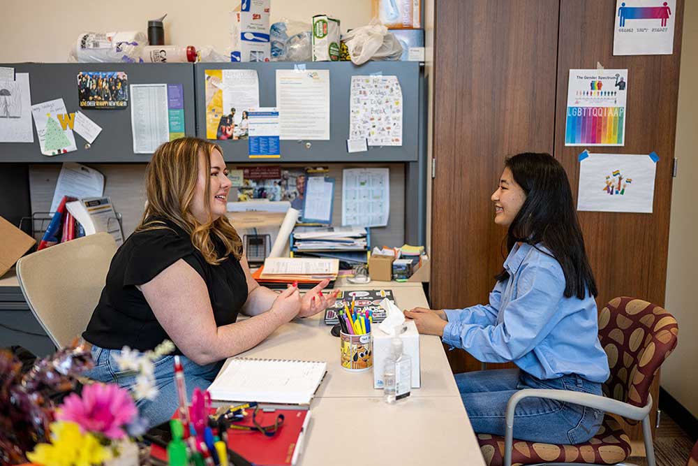 The program helps students submit college applications and find scholarships. Image credit: Eric Bronson, Michigan Photography
