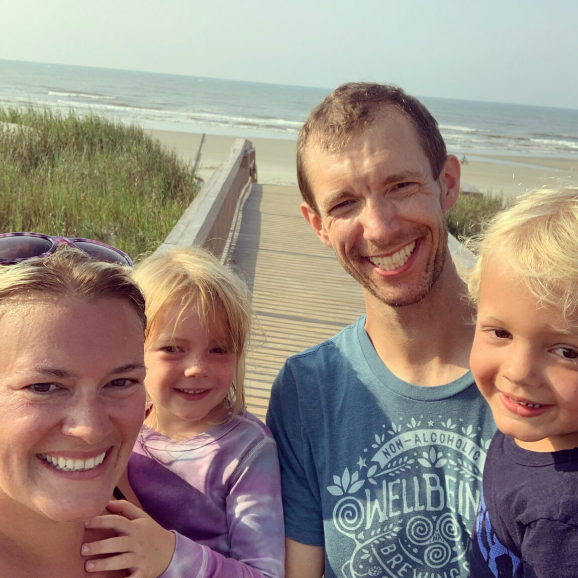 Kate Compton Barr, shown with her husband, Daniel; daughter, Winnie; and son, Max, served as CEO of a baby box manufacturer called Pip & Grow before returning to U-M earlier this year. (Photo courtesy of Kate Compton Barr)