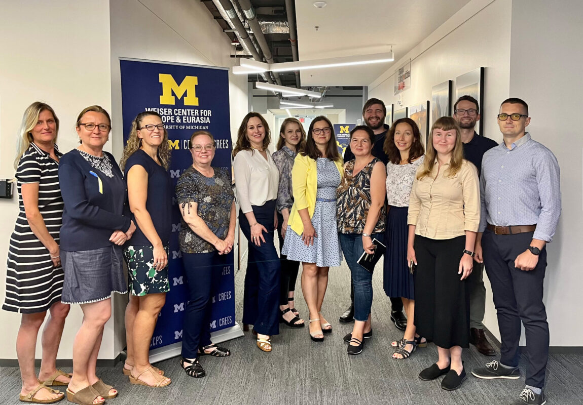 The seven Scholars at Risk Fellows from Ukraine stand with staff members of the Weiser Center for Europe and Eurasia. (Photo courtesy of Weiser Center for Europe and Eurasia)