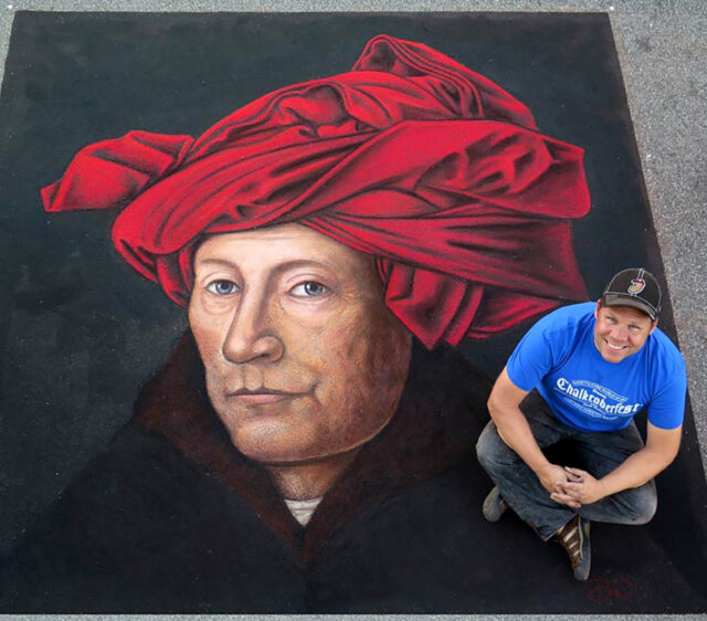 Dave Brenner poses at his first professional street painting festival, Chalktoberfest, where he completed this recreation of Jan van Eyck's “Portrait of a Man.” (Photo courtesy of Dave Brenner)