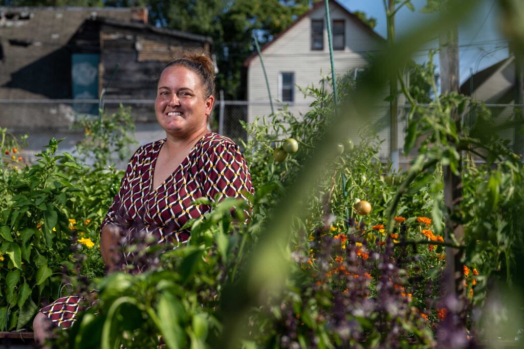 Sarah Clark had the idea to take a former Cadillac executive parking lot and turn it into a one-acre urban garden located in Mexicantown. That was 10 years ago when she was earning her master's in urban planning from U-M. She's now the director of Land and Water Programs at Southwest Detroit Environmental Vision. Image credit: Eric Bronson
