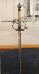 His most prized possession in Todd Coon’s collection is a rapier gifted to him by his wife, Laura, that is displayed in a plastic case made by a friend. (Photo courtesy of Todd Coon)