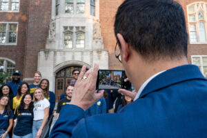 Santa J. Ono photographs students at the Union.