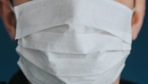 Person wears a mask