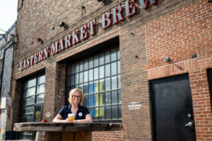 Pauline Knighton-Prueter, a 2012 graduate of U-M, started out at Short's Brewing and now heads sales at Eastern Market Brewing Co. She co-founded Fermenta with two experienced brewers. Image credit: Eric Bronson, Michigan Photography