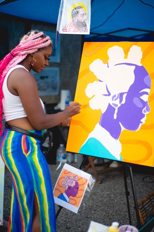 DaJaniere Rice, multimedia graphic designer for LSA Advancement, leads a paint party class through one of her creations. (Photo courtesy of Jewelle Baggett)