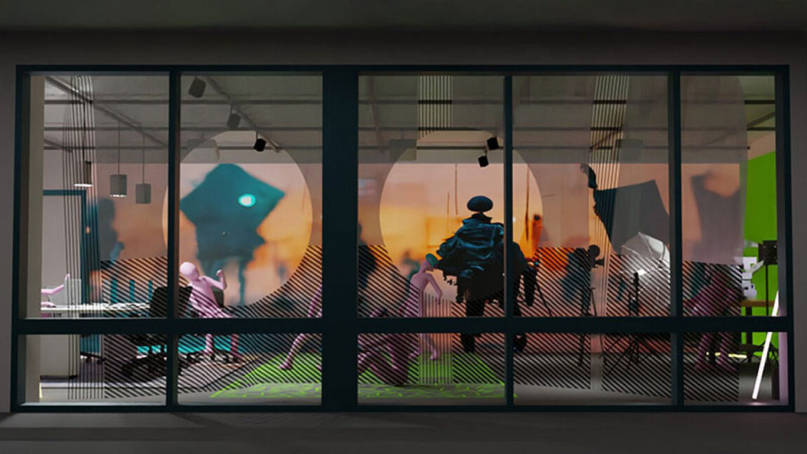 Photo of figures in The TVLab at the A. Alfred Taubman College of Architecture and Urban Planning.