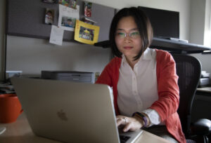 Zhen Xu,Professor of Biomedical Engineering at the University of Michigan works in her office. Image credit: Marcin Szczepanski/Lead Multimedia Storyteller, Michigan Engineering