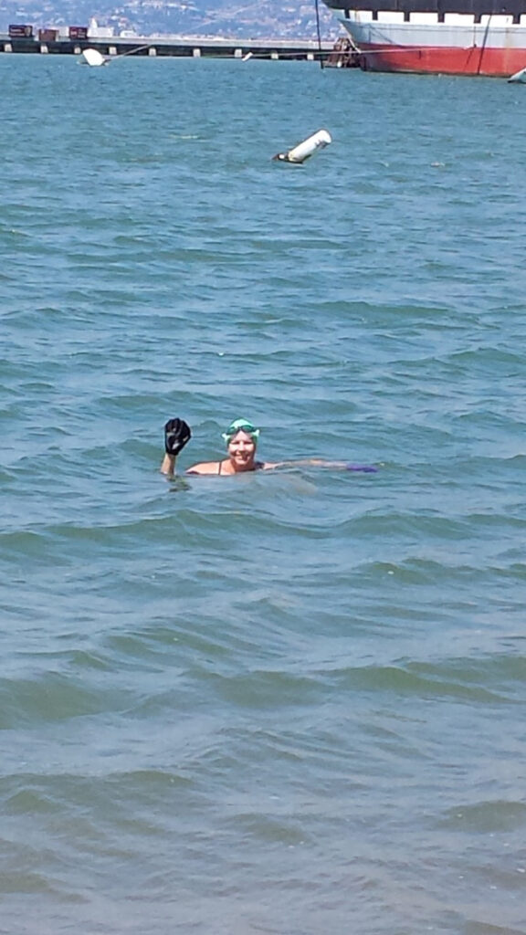 Despite growing up in landlocked Colorado, Ann Evans Watson always felt drawn to the water and takes part in long-distance saltwater swims. (Photo courtesy of Ann Evans Watson)